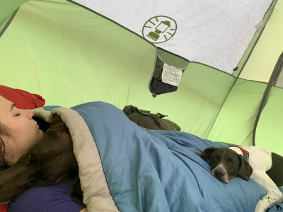 Camping is the best. Both girls enjoy snuggling in the tent. They're very warm.