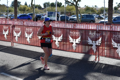 Elizabeth finishing a marathon.