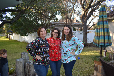 Elizabeth with Lee's sister and mom. Got to love our ugly Christmas sweaters.
