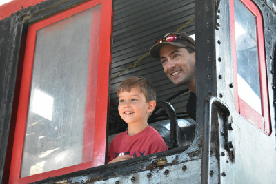 Lee and his nephew enjoying a railroad museum.