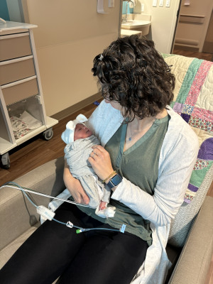 Elizabeth meeting Juliana for the first time in the NICU.