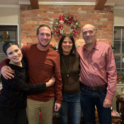 Celebrating Christmas with Megan's parents, Paula and Scott.