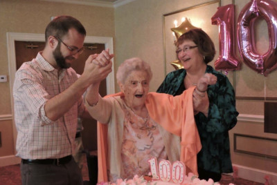 Johnny, his mom, and his grandmother, Angie, at Angie’s 100th birthday party