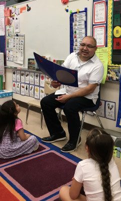 Will is an administrator and finds every chance he can to go to classrooms. Here he is reading one of his favorite children’s books to a kindergarten class.  