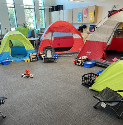 JoAnna loves providing fun experiences for her students.  This year we finished out the school year with Camp Learned-A-Lot with transforming the classroom into a campground and sharing in fun activities, art projects, songs and yummy snacks! 