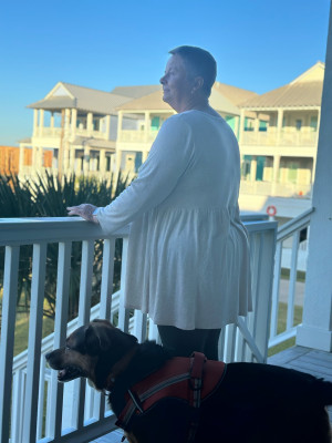 Paul's mom and Blue enjoying the ocean air at our family beach house