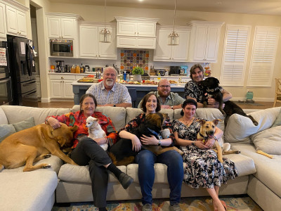 Sarah's immediate family includes her parents, brother, and sister-in-law, and of course, everyone's dogs!