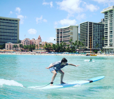 Owen learning to surf in Hawaii