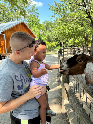 Feeding the goats at the Farmstead