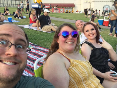 This is us with our friends, Sally and Jason, at a concert.