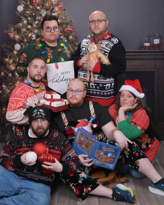 Every year, we take funny Christmas portraits with the framily.