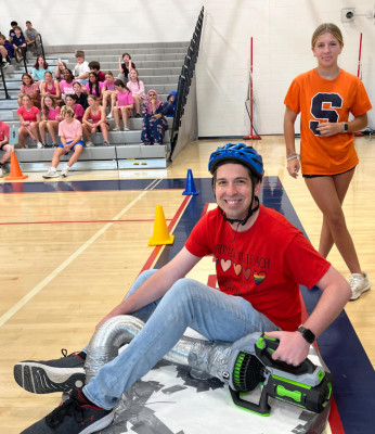 David getting ready to race student-made hovercrafts as part of field day activities!