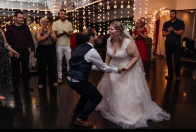 Dancing at our wedding reception! Our DJ said he had never seen a couple dance together as much as we did at our wedding!