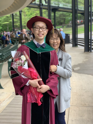 Brandon & his mom, Jenny, at medical 
school graduation...officially a doctor!