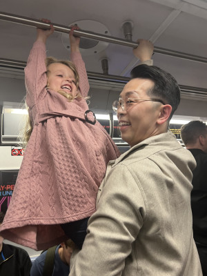 Uncle Brandon taking our niece, Payton, on a train ride!