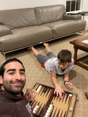 Zac & our nephew playing board games.