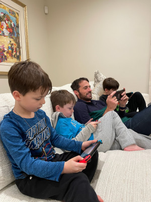 Jesse playing Mario Kart with three of our nephews.