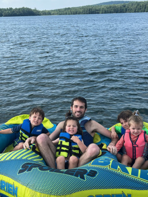 Jesse tubing with our nephews and niece.