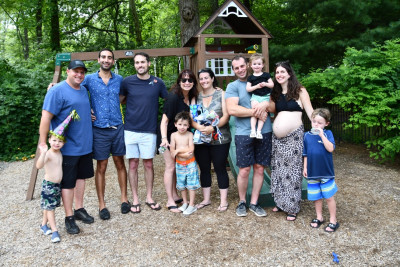 Jesse’s side of the family celebrating a birthday in the backyard.