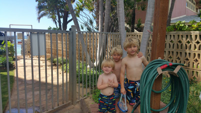 The boys by the pool at the condo we stayed at in Hawaii.
