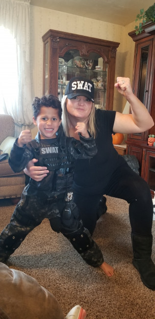 SWAT may stand for Special Weapons And Tactics, or does it stand for Sweet Woman At Times. Trish love Halloween and she loves dressing up with Colston.