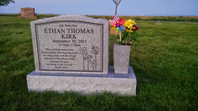 Ethan's headstone is in a small cemetery close by our house.  We like to go there often and bring him new pinwheels. 