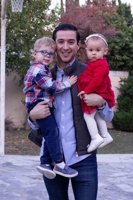 Tio Rodrigo holding his two nephews when we visited Mexico last Christmas