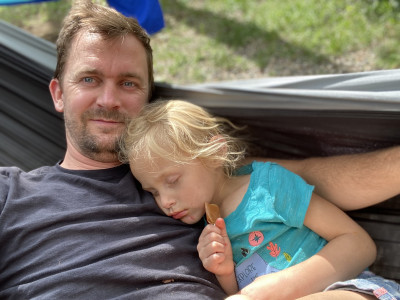 We love to take naps in hammocks!  After a long day of playing at the cabin, she was exhausted and snuggled up to Bryce and took a nap in the hammock.